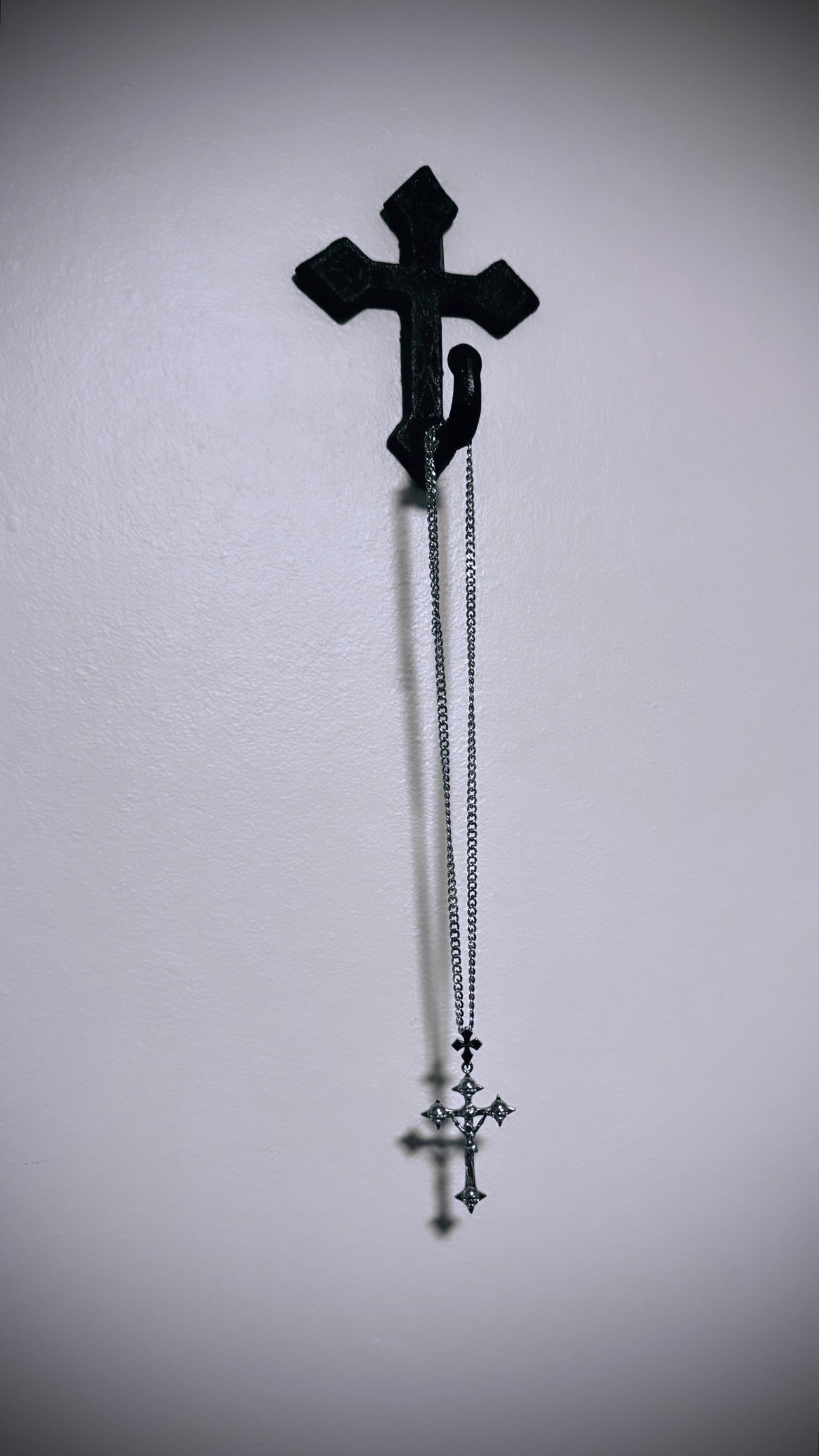 Crucifix necklace hanging