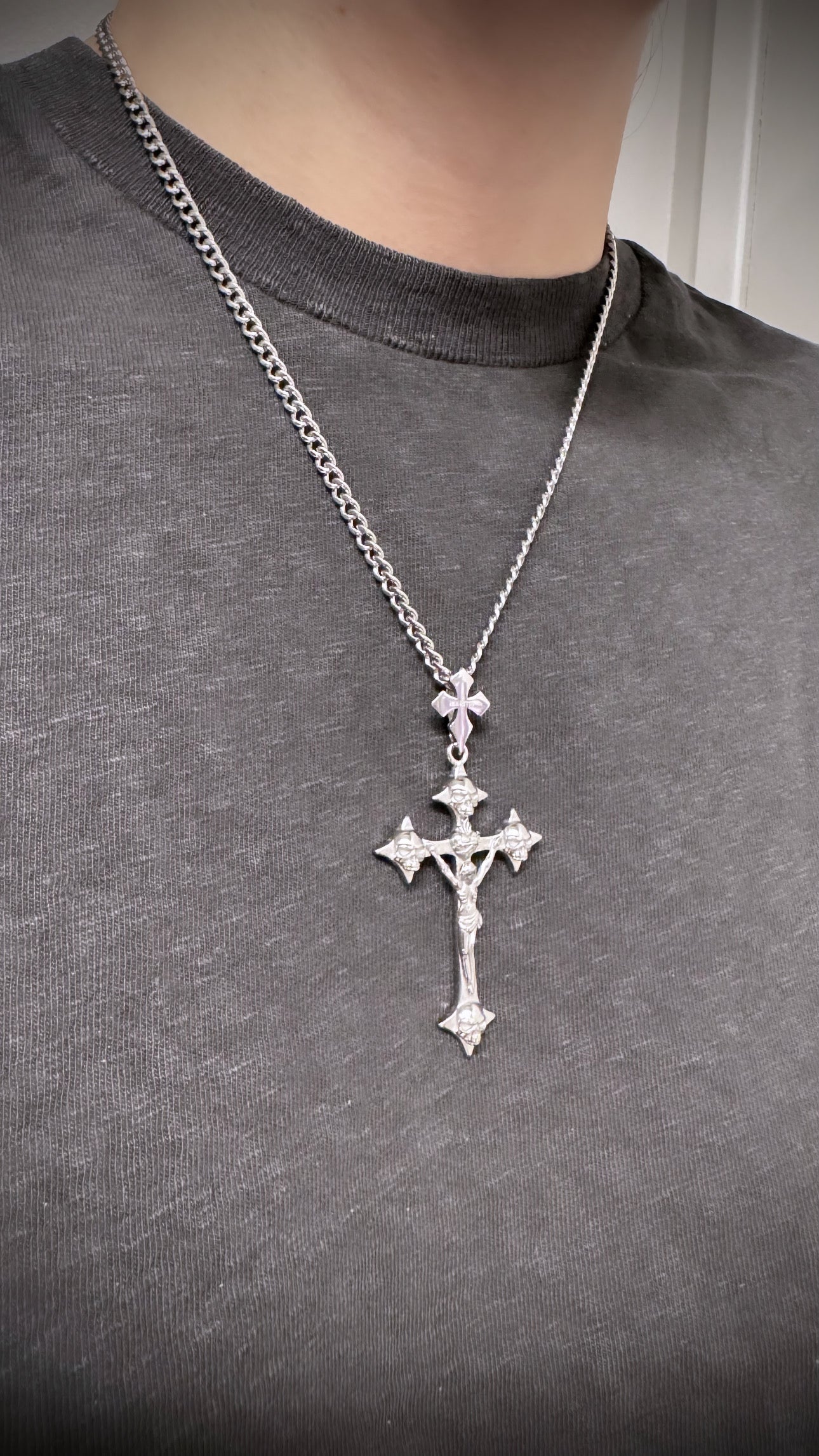 Necklace with crucifix pendant